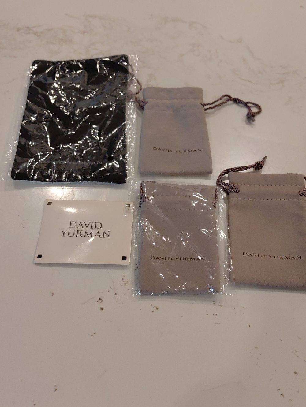 3 David Yurman Grey Jewelry Pouches, 1 Guarantee, 1 Cleaning Cloth.  5pcs In All